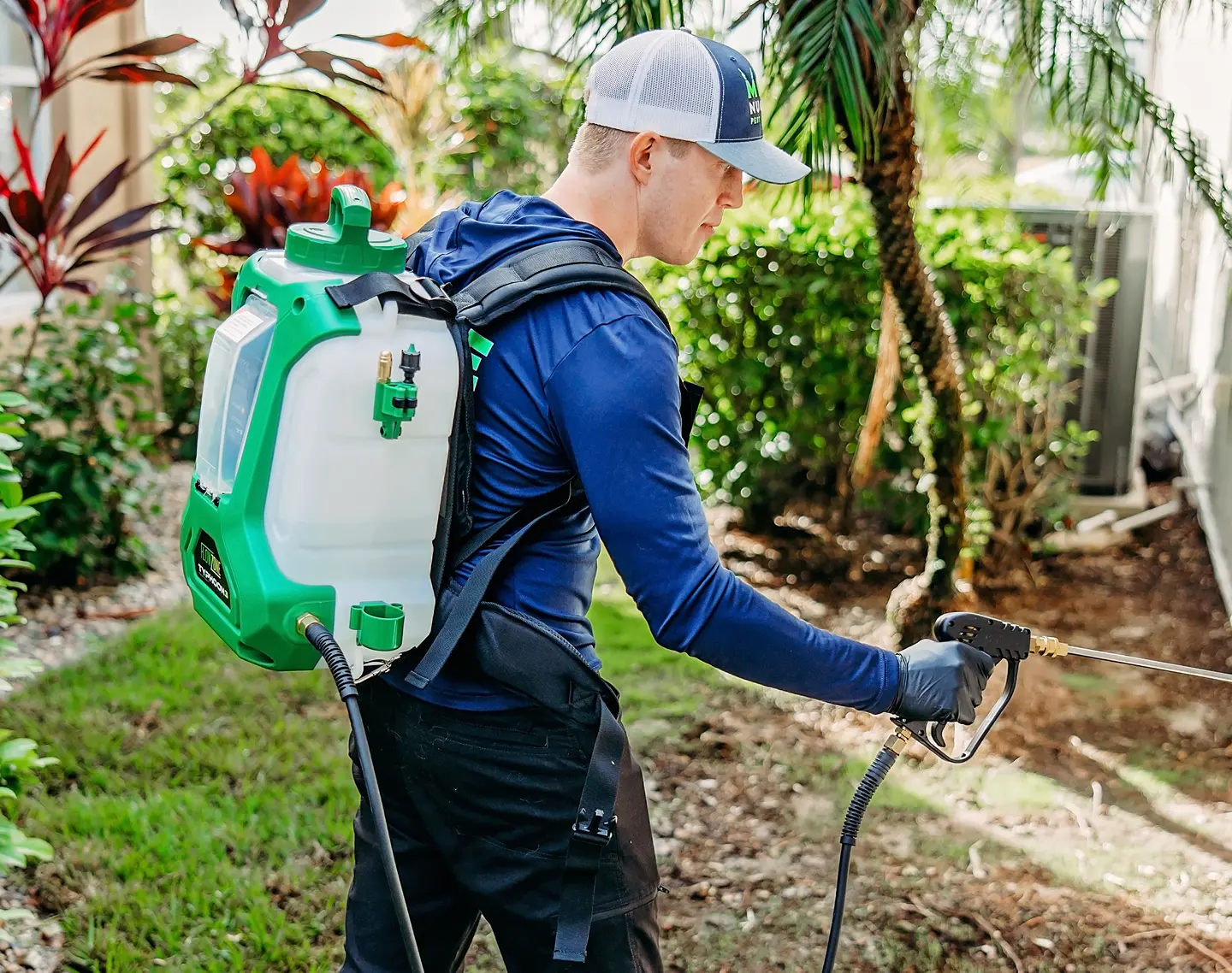 Man spraying for bugs